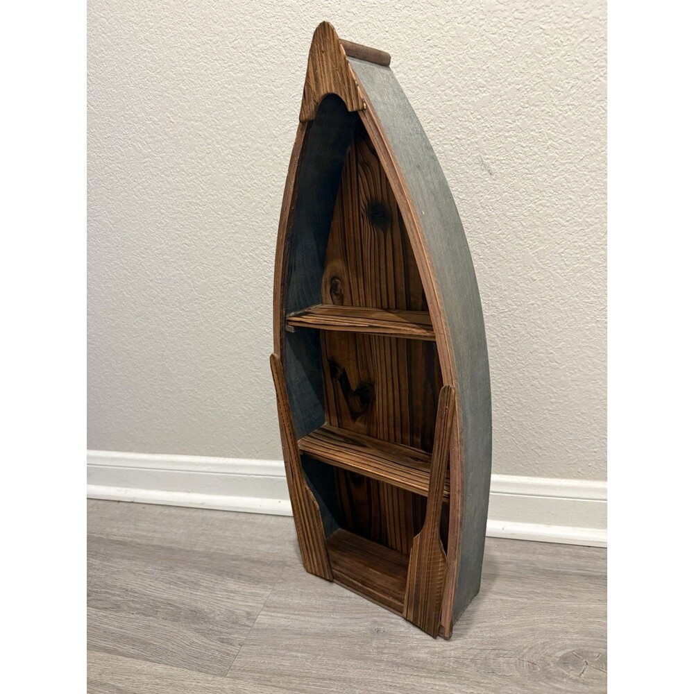 Rustic Wooden Boat Canoe With Oars Shelf